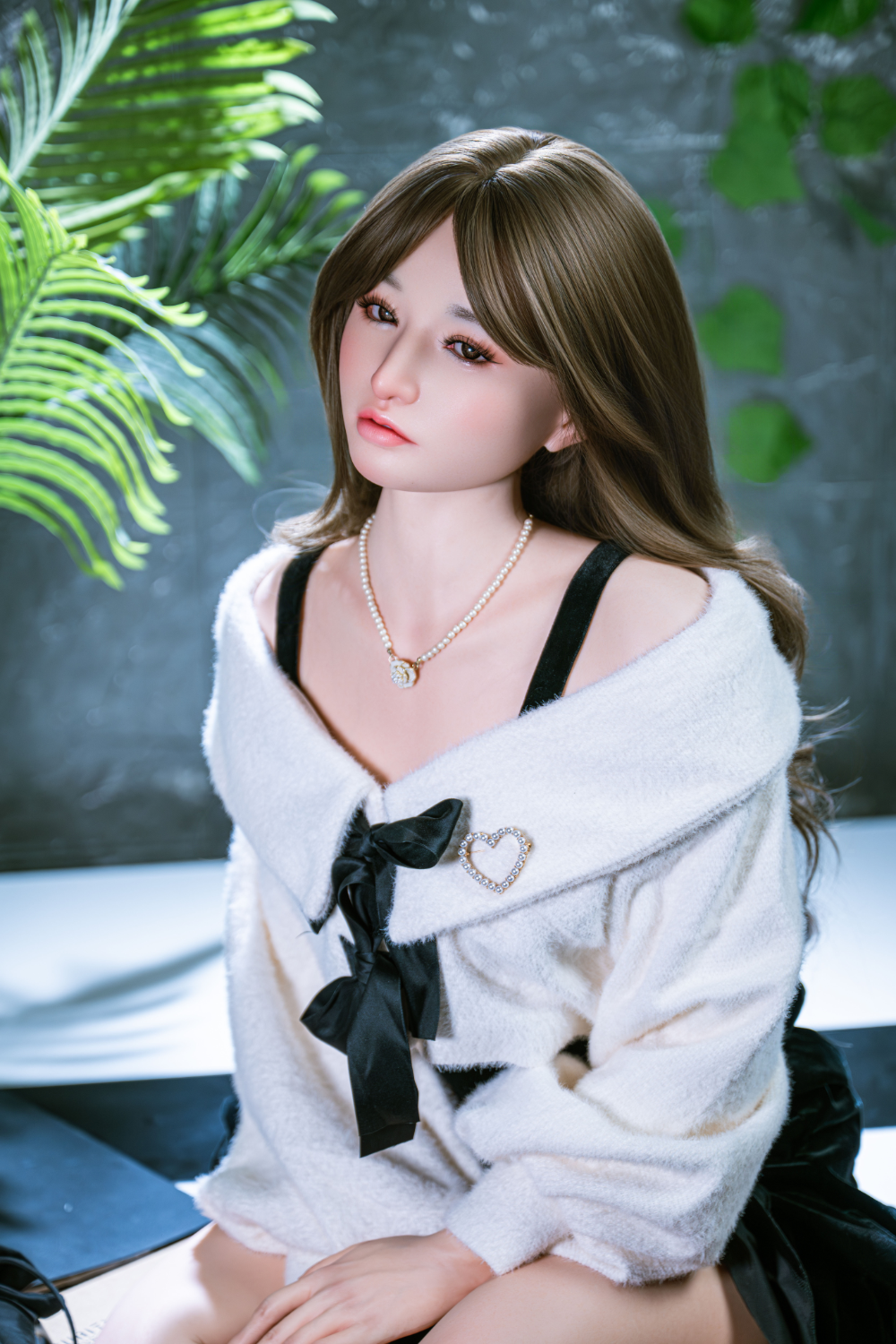 TAYU Doll 160cm A Silicone Series - Angel wearing a white robe with black accents in a room with green plants.