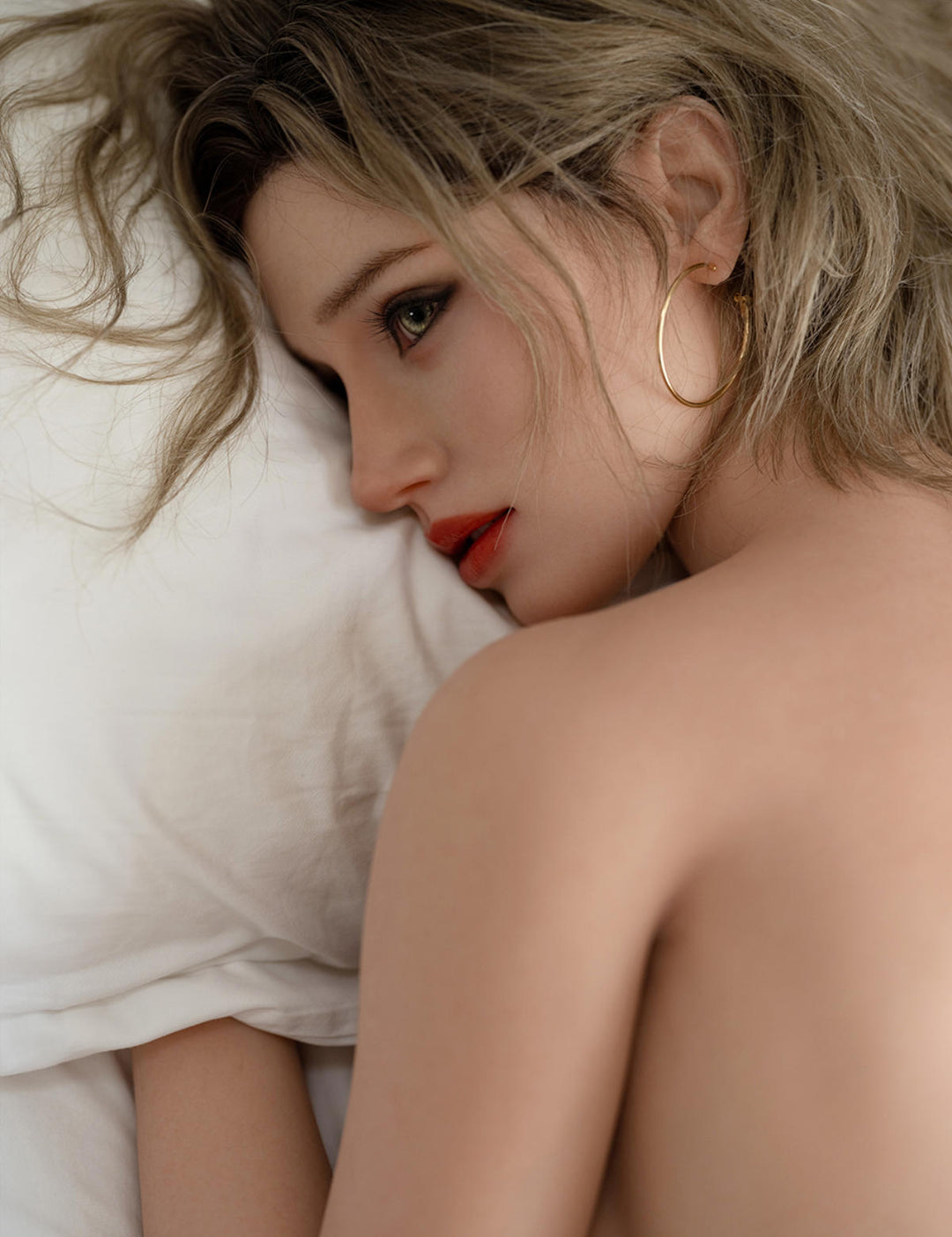 TOP-CYDOLL 168cm F-Cup Sofia Realistic Sex Doll with red lipstick lying on a white pillow