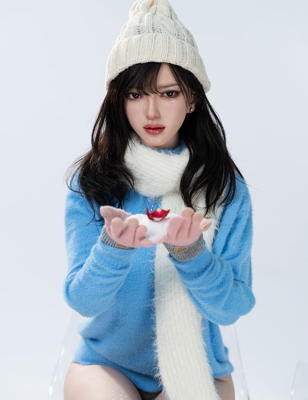 Mid-shot of TOP-CYDOLL 168cm F-Cup Bingbing Realistic Sex Doll holding a snow in her hands.