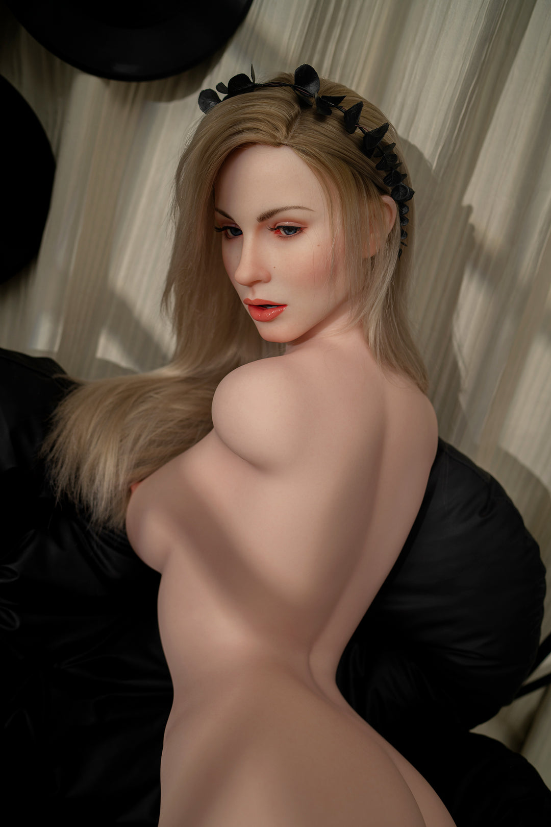 Close-up of Zelex SLE Series doll’s torso standing side way, emphasizing the detailed body sculpt.