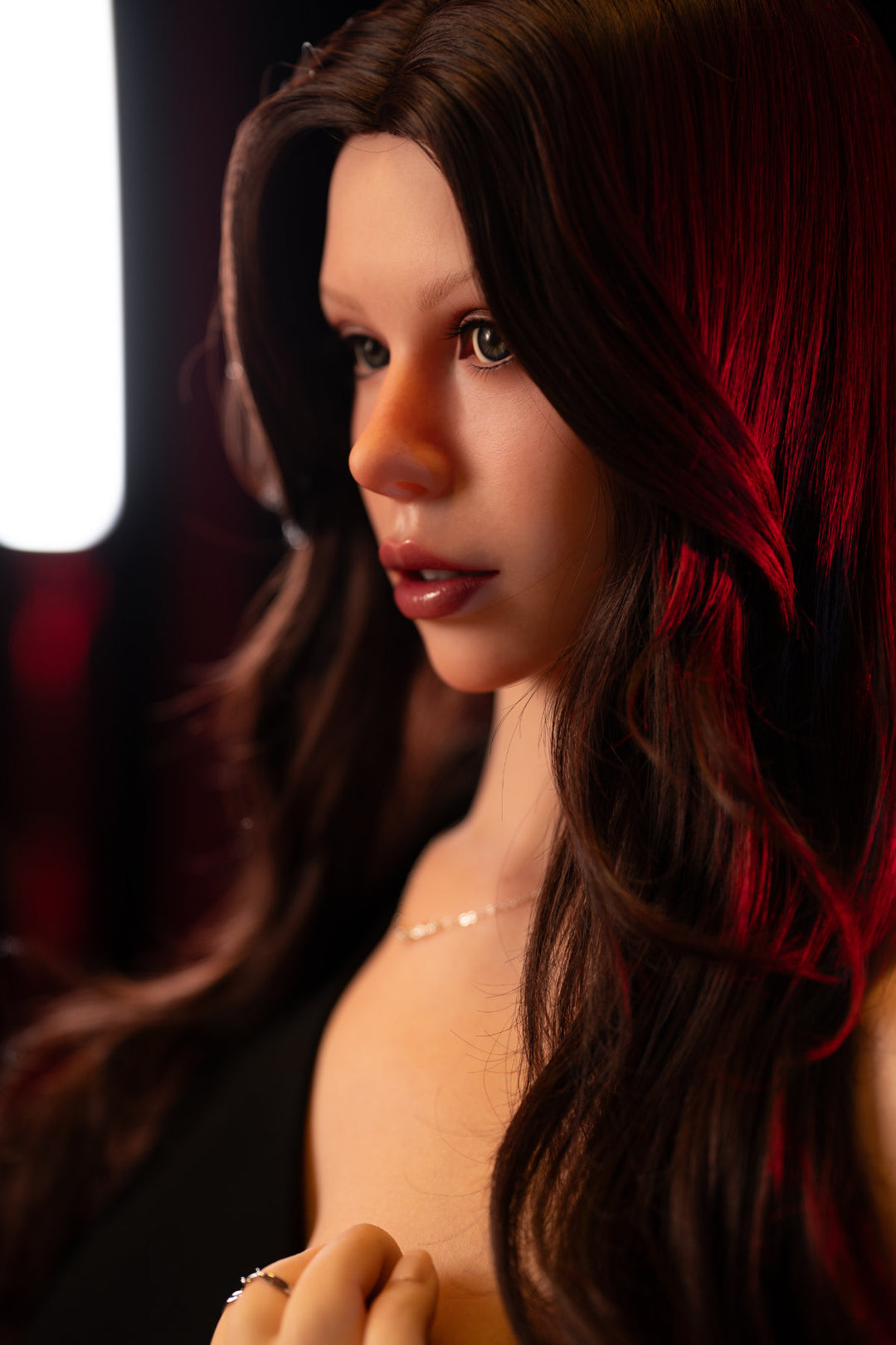 Zelex Doll Inspiration 165 cm F Silicone - GE181 upper body nude front view, long dark wavy hair, dark dramatic background
