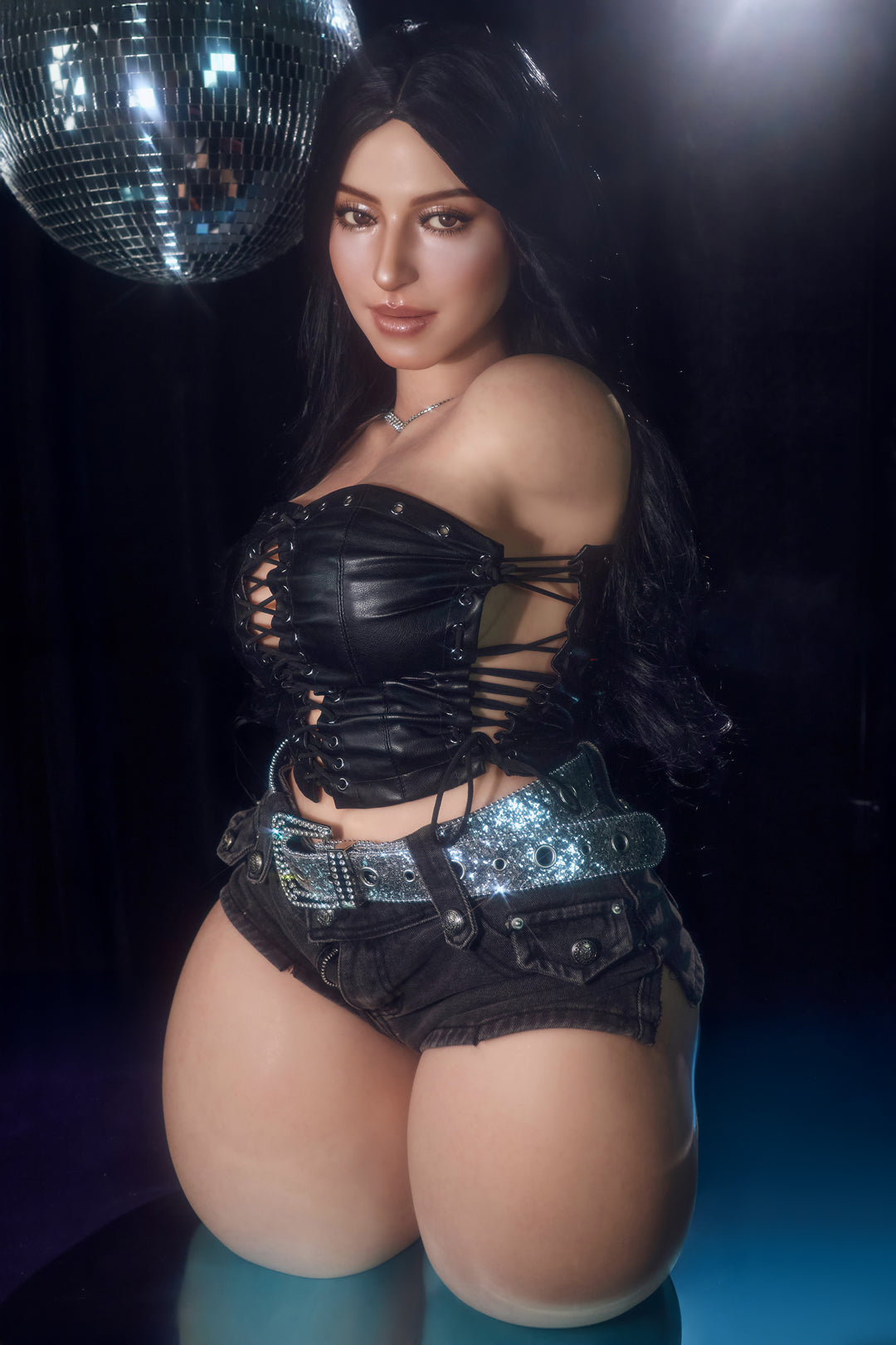 CLIMAX DOLL - ULW 885# Silicone Torso - Renata (Natural) – long black hair and brown eyes, black lace-up leather corset and denim micro shorts under a disco ball