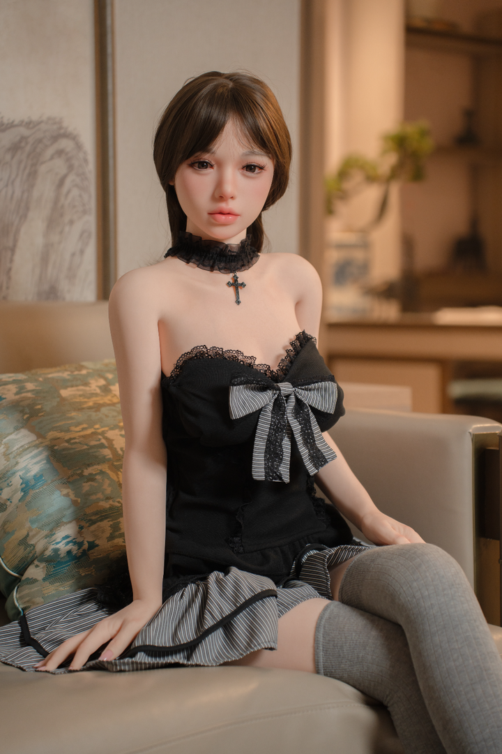 Realistic sex doll Katniss V2 with short brown hair in a gothic-style dress, lifelike silicone body.